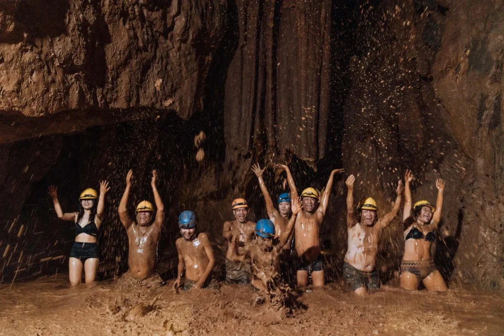 zipline adventure and mud bath at Dark Cave viet nam fishing tours