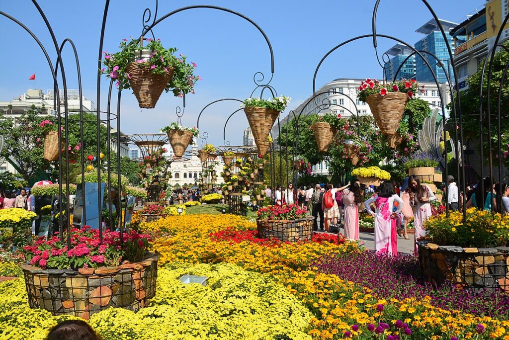 Tourists stroll along Nguyen Hue flower street during the Lunar New Year 2026.
