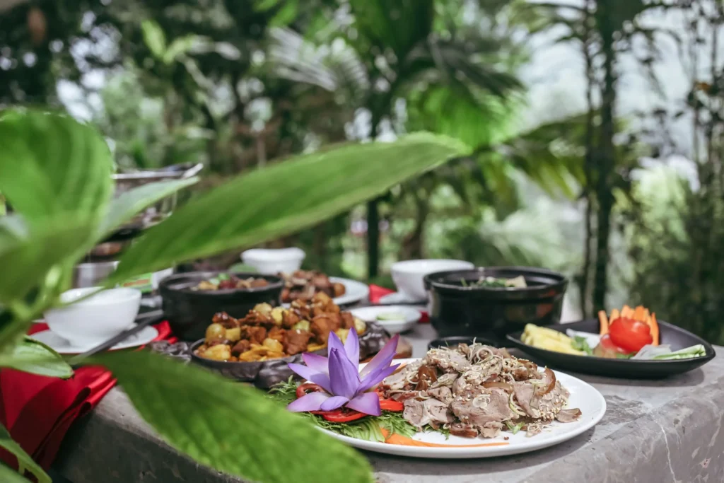 Lunch with local specialties such as mountain goat and crispy rice.