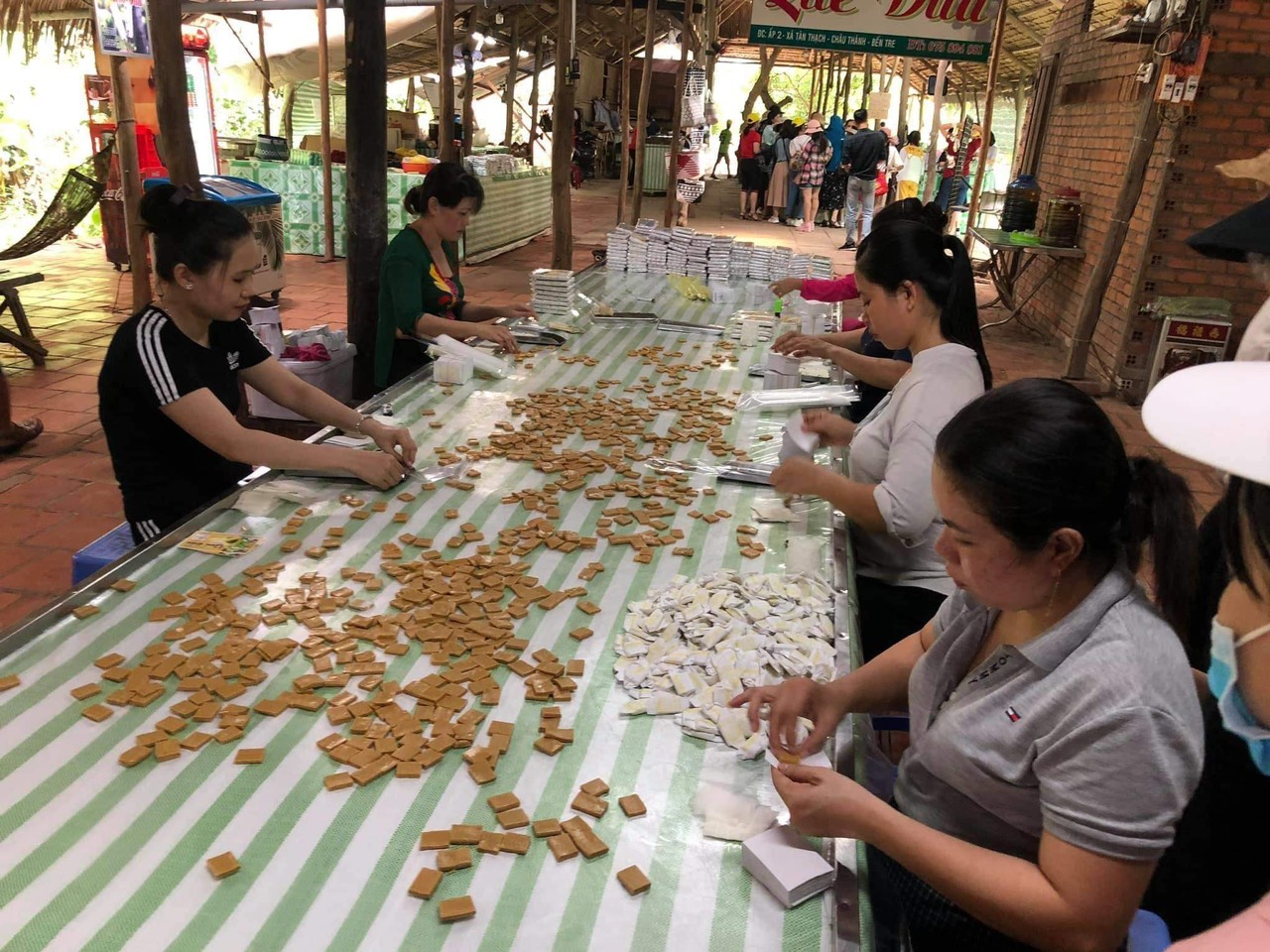 traditional coconut candy making village in Ben Tre