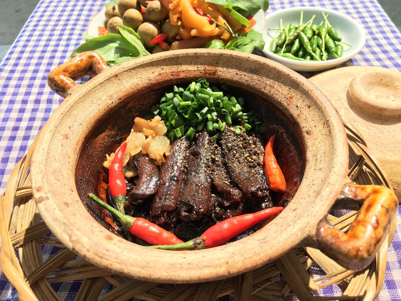 savory river fish cooked in clay pots