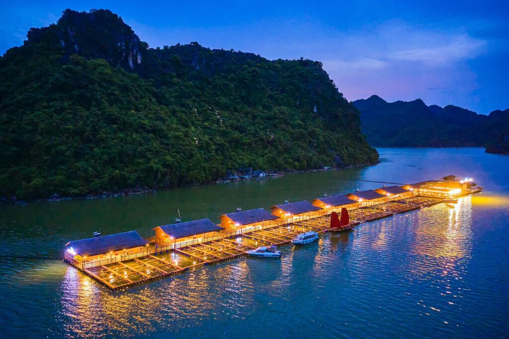 Fishing from private floating rafts in Ha Long Bay in northern Vietnam.