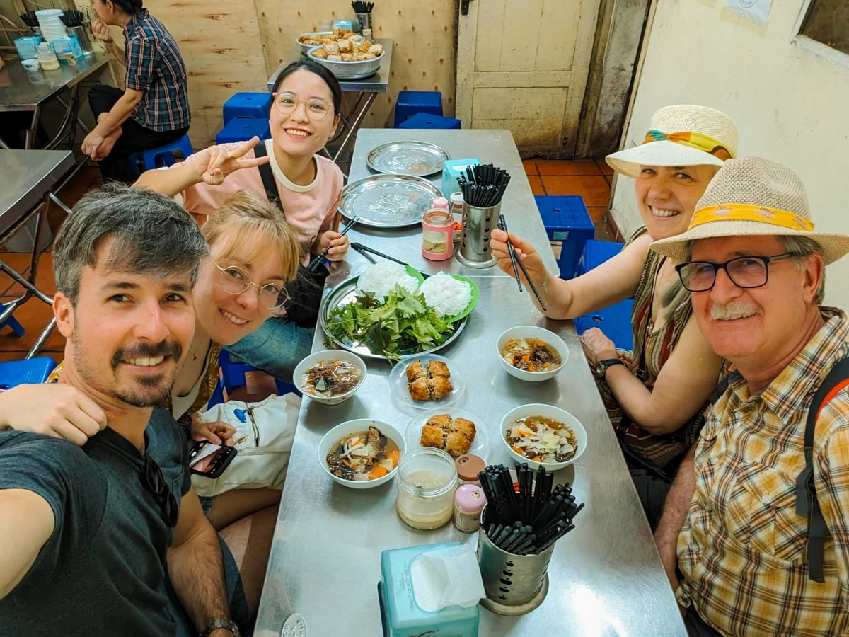 devouring Bun Cha in Hanoi,  Northern Vietnam Travel